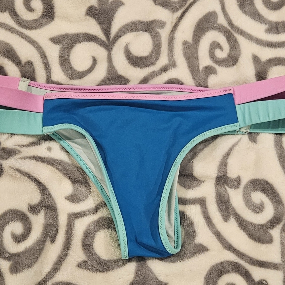 VICTORIA SECRET! Bikini bottom size medium colors blue,Teal, and pink